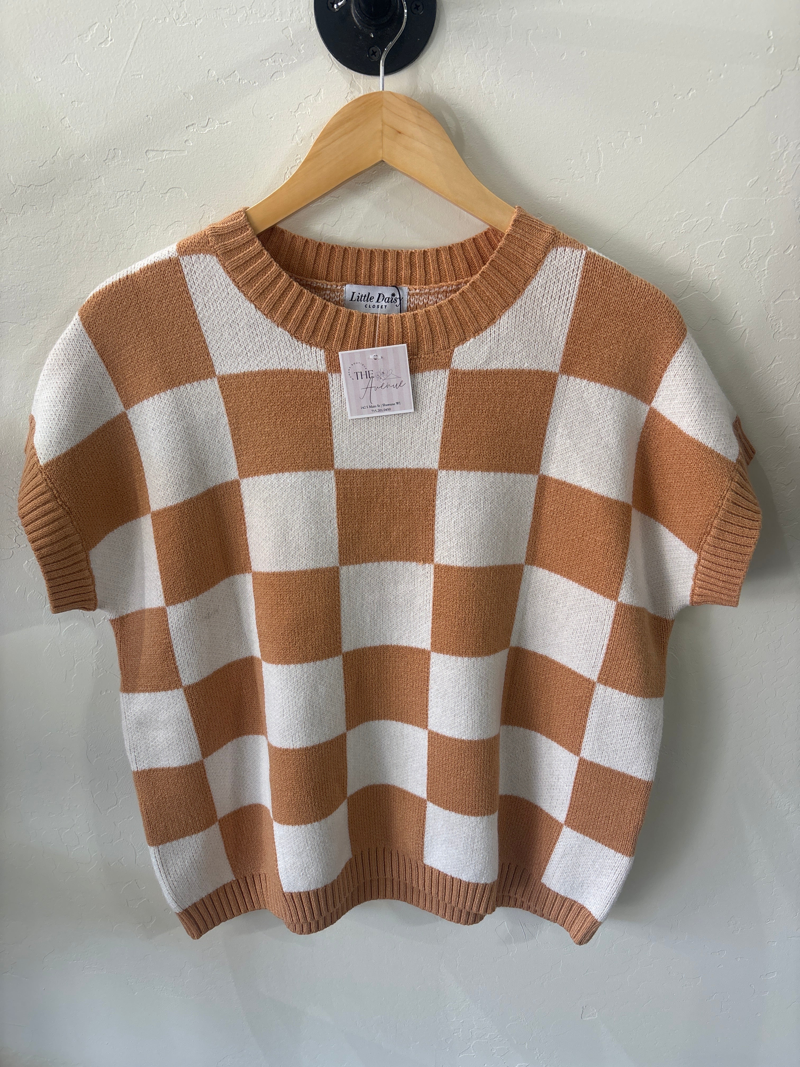 Brown and white checkered knit shirt