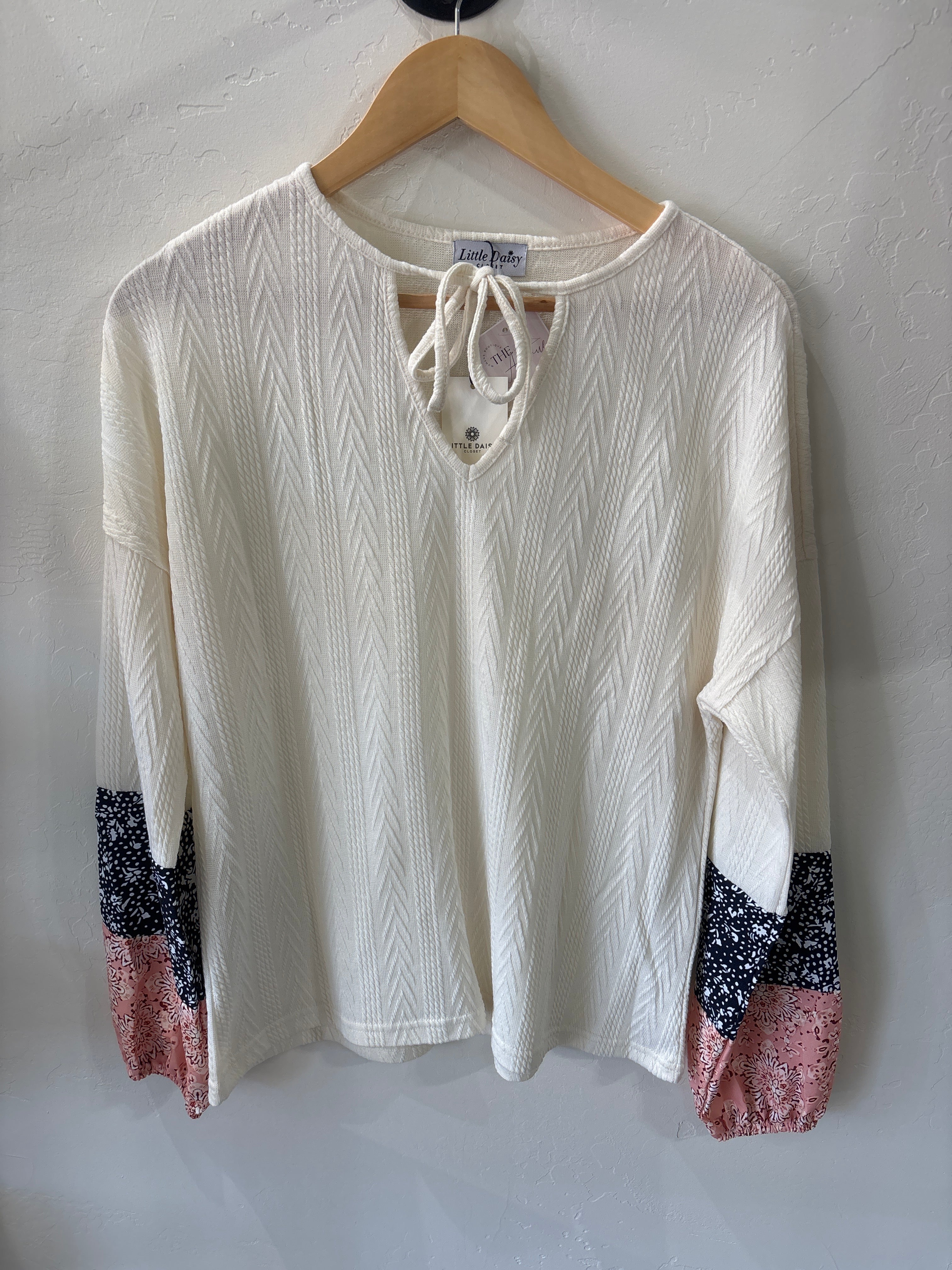 White long sleeve with floral sleeves