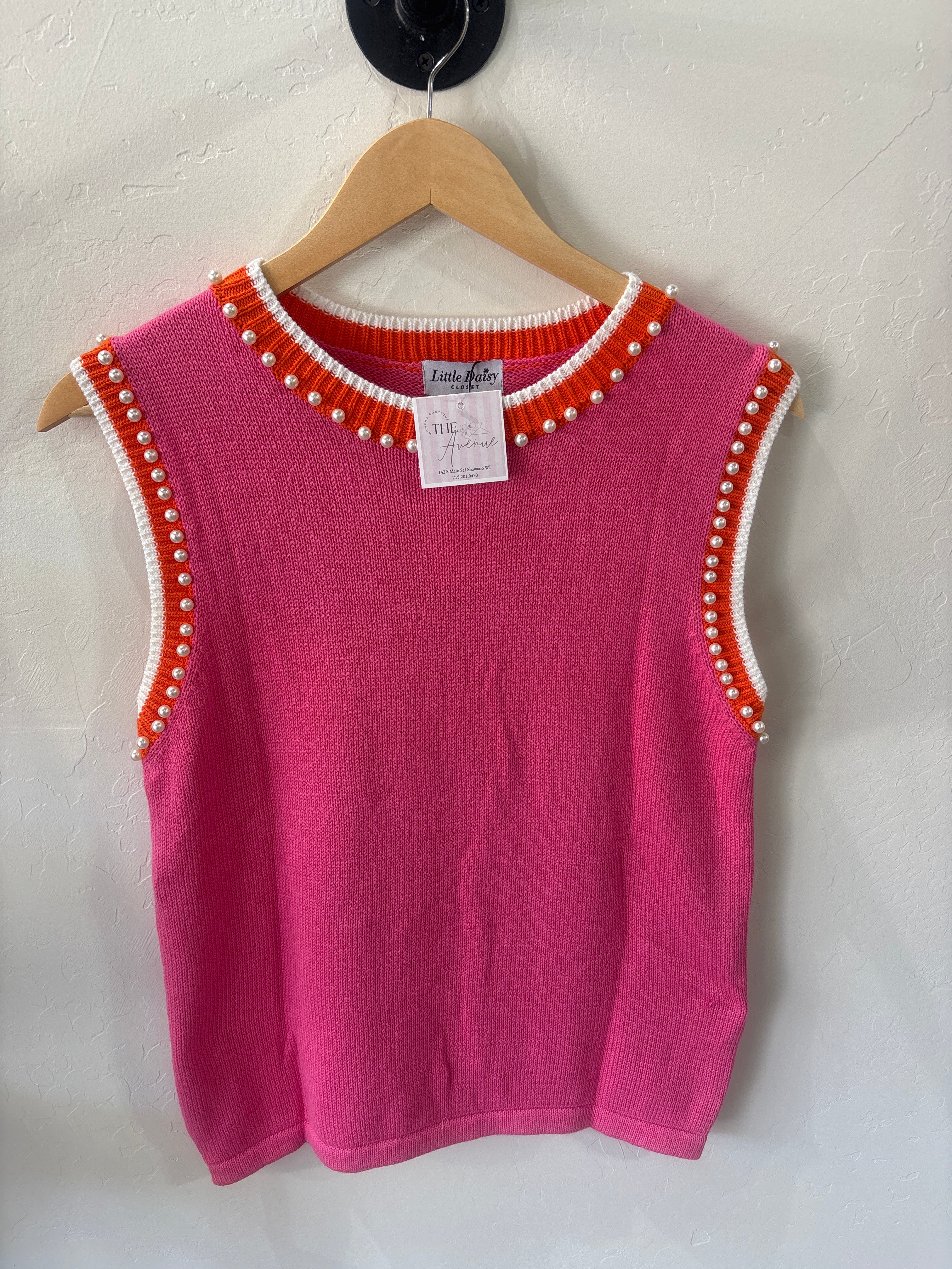 Pink knit vest with pearls