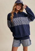 Blue half zip with light blue floral
